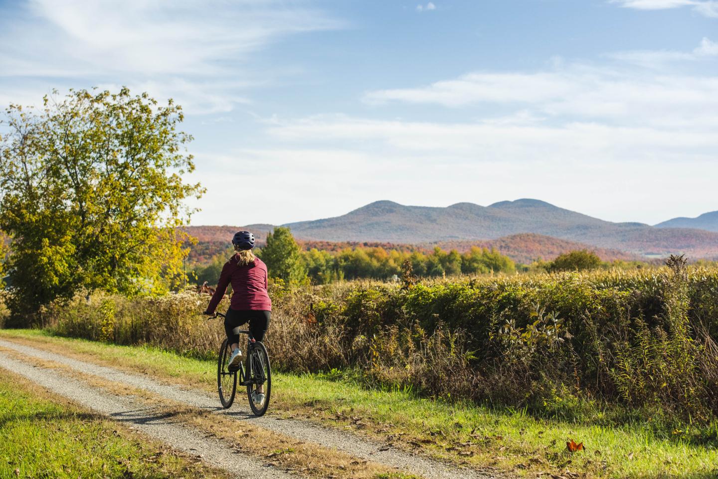 A person biking along a trail