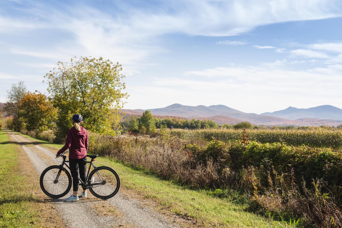 A person on a bike on a trail
