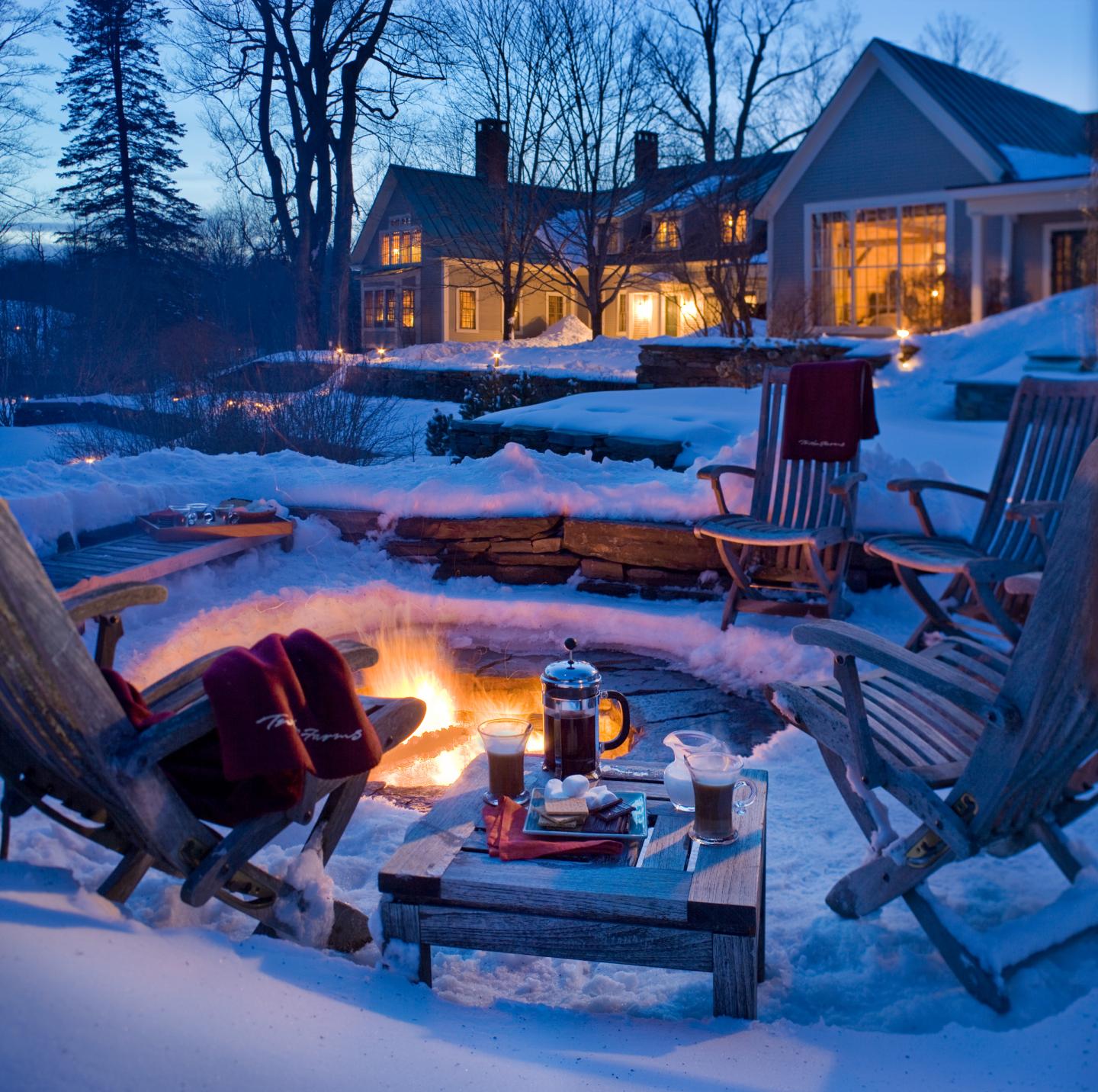An outdoor fire pit in winter