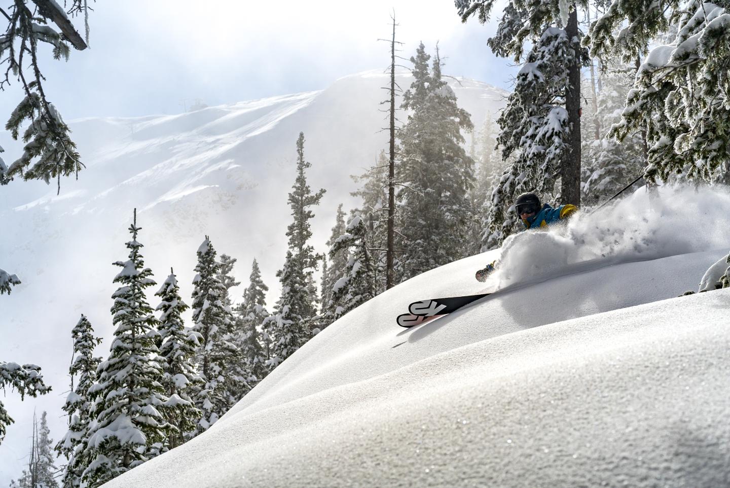 A person skiing through powder