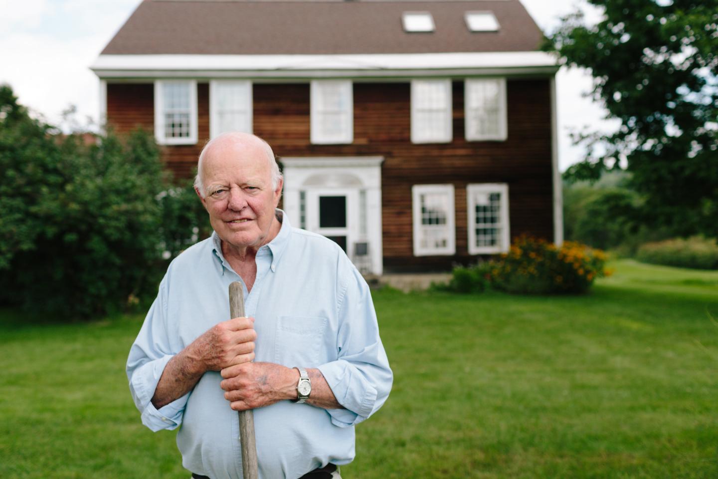 Joe Cushing in front of his home in Franconia 