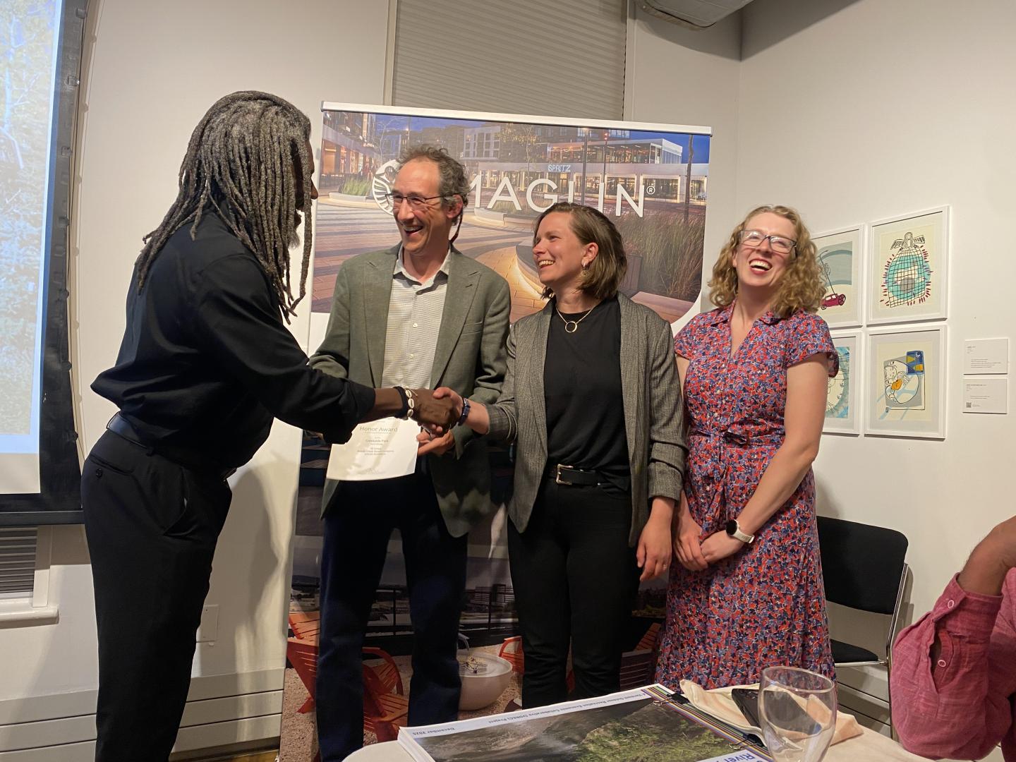 Adam and Elena accept award for Creekside Park