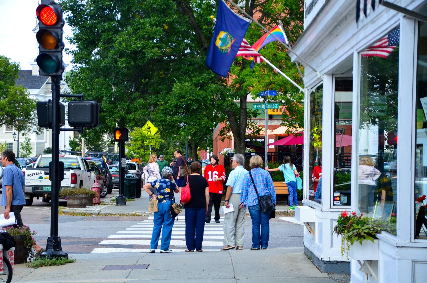 People walking on the sidewalk in downtown Montpelier